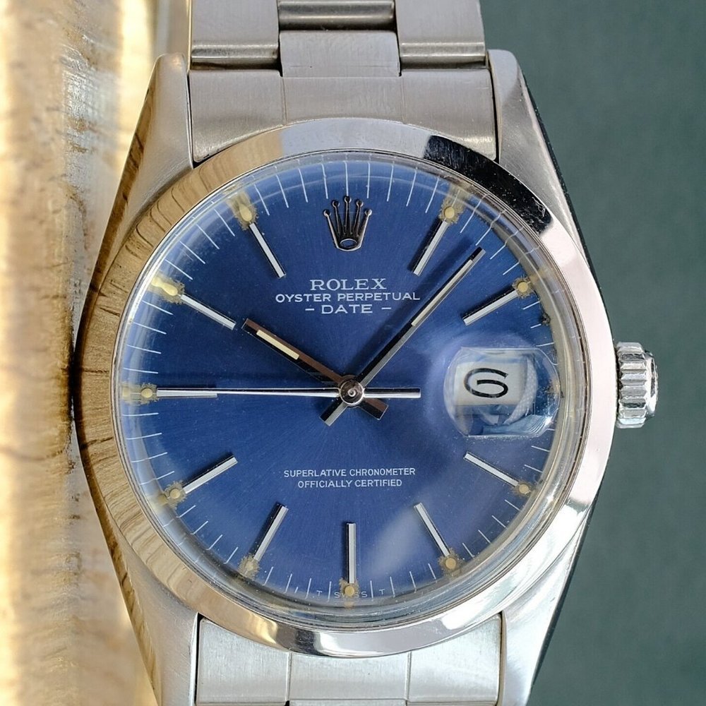 ROLEX DATE UNISEX BLUE INDEX DIAL STAINLESS STEEL SMOOTH OYSTER WATCH 34 MM 1500